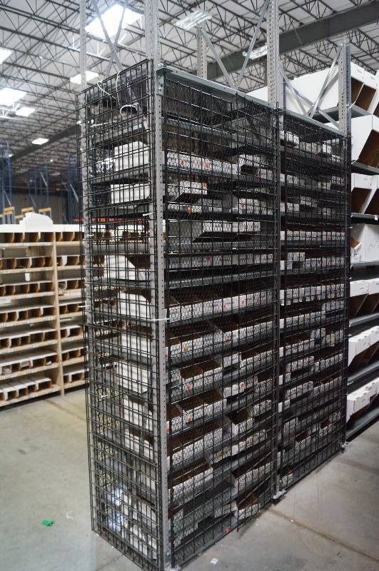 lot 2100 image: Cage Lock up system  Shelving