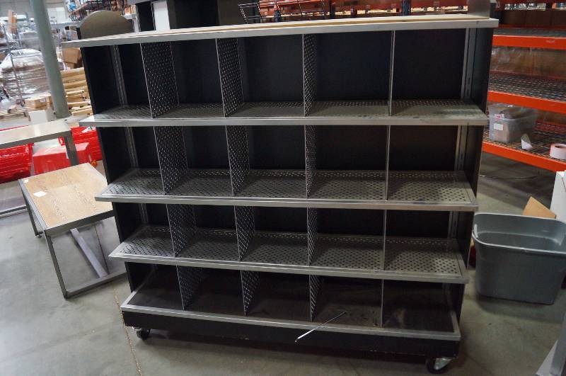 lot 1292 image: Rolling  double sided rack with cubbys