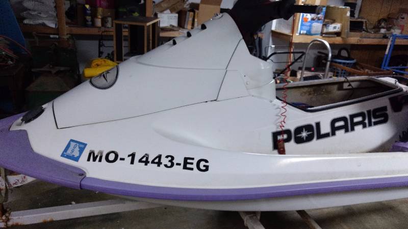 lot 2 image: 1996 Polaris Jet ski with double trailer