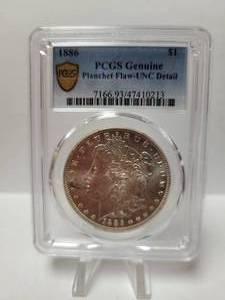 lot 29 image: 1888 MORGAN SILVER DOLLAR-PCGS CERTIFIED AND ENCASED PLANCHET FLAW COIN