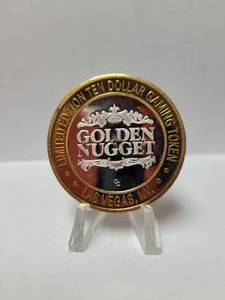 lot 31 image: GOLDEN NUGGET LIMITED EDITION $10 GAMING TOKEN .