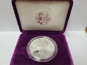 lot 76 image: 1991 SILVER EAGLE $1 COIN-1OZ .999 FINE SILVER