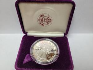 lot 77 image: 1986 SILVER EAGLE $1 COIN-1OZ .999 FINE SILVER