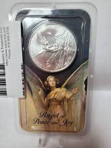 lot 78 image: 2005 ANGEL OF PEACE AND JOY .999 FINE SILVER COIN
