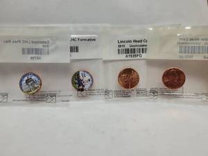lot 420 image: 4) LINCOLN PENNIES (2) COLORIZED & (2) UNCIRCULATED