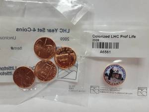 lot 424 image: 2009 4-COIN LINCOLN HEAD CENT SET & (1) 2009 COLORIZED LINCOLN HEAD CENT