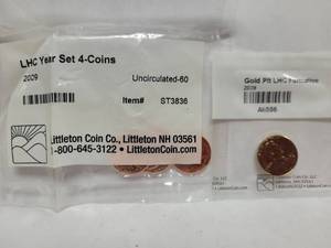 lot 427 image: 2009 LINCOLN HEAD CENT 4-COIN SET & (1) 2009 GOLD PLATED LINCOLN HEAD CENT