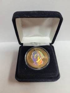 lot 456 image: GOLD TONE WASHINGTON $1 COIN WITH HOLO EFFECT