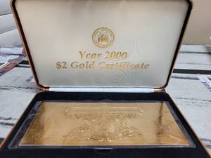 lot 524 image: YEAR 2000 TWO DOLLAR GOLD CERTIFICATE WITH COLLECTORS CASE