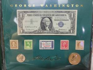 lot 544 image: 1957 SILVER CERTIFICATE IN COLLECTORS BOOK W STAMPS & BICENTENNIAL COINS