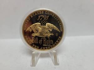 lot 555 image: 2013 GOLD LAYERED US CONSTITUTION BILL OF RIGHTS PROOF COIN
