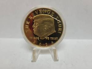 lot 557 image: 2024 GOLD TONE THE REVENGE TOUR DONALD TRUMP COIN