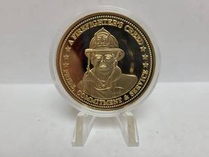 lot 559 image: 2010 GOLD LAYERED FIREFIGHTERS-AMERICAN HEREOS PROOF COIN