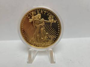 lot 560 image: 2003 GOLD PLATED REPLICA OF A 1933 GOLD DOUBLE EAGLE PROOF