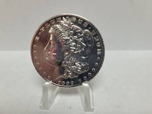 lot 567 image: REPLICA-1889 MORGAN DOLLAR CC TRIBUTE PROOF