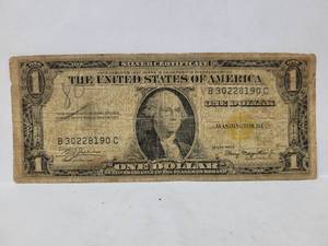 lot 595 image: 1935 ONE DOLLAR SILVER CERTIFICATE (YELLOW SEAL)