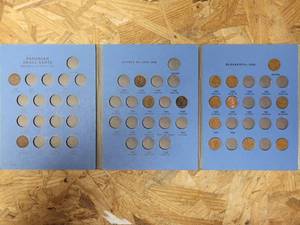 lot 657 image: CANADIAN SMALL CENT COLLECTORS BOOK WITH (15) PENNIES