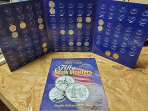 lot 658 image: COLLECTORS VALUE GUIDE FIFTY STATE QUARTERS WITH (19) QUARTERS & (2) SACAGAWEA DOLLARS