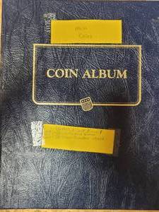 lot 661 image: COIN ALBUMBINDER WITH (7) COINS INCLUDED