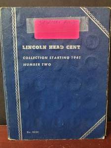 lot 690 image: 50) WHEAT PENNIES IN COLLECTORS BOOK