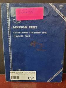 lot 691 image: 72) PENNIES IN COLLECTORS BOOK--(35 WHEAT PENNIES & 37 MEMORIAL PENNIES)