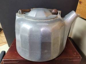 lot 718 image: LARGE ALUMINUM TEA KETTLE WITH WOODEN HANDLE