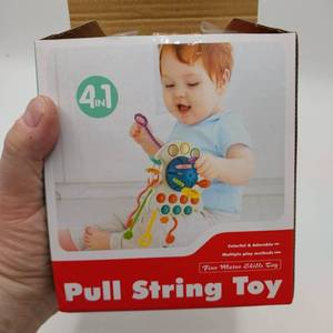 lot 12833 image: Fine Motor Skills, pull string toy