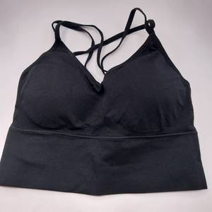 lot 13504 image: DOULAFASS Sports Bras for Women Strappy Sexy Cute Cross Back Light Support Workout Yoga Bra Tops with Removable Cups (Medium, YD008-Black)