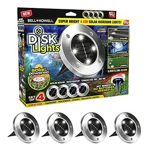 lot 14033 image: BellHowell Disk Lights Solar Ground Lights -Wireless Auto OnOff Solar Pathway Garden Outdoor Lighting with 4 LED Bulbs for Lawn, Patio, Garden, Yard, Pathways Waterproof, 4 Packs, As Seen On TV appears used - powers on