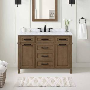 lot 54642 image: Home Decorators Collection Caville 48 in. W x 22 in. D x 34.5 in. H Single Sink Bath Vanity in Almond Latte with Carrara Marble Top with Outlet