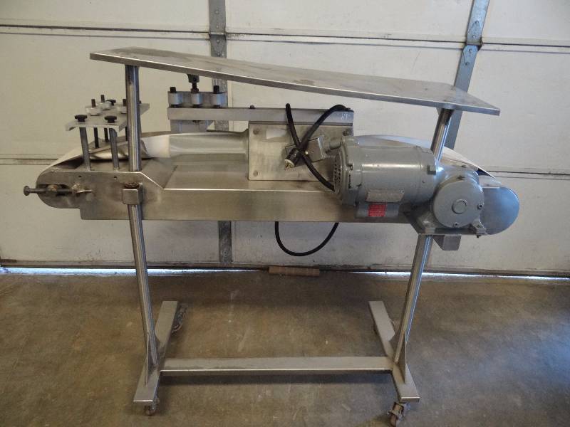 lot 1024 image: Un O Matic Roll Machine