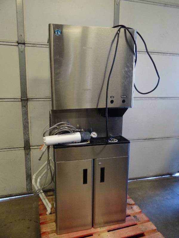 lot 1028 image: Hoshizaki Stainless 321 Lb Air Cooled Ice And Water Dispenser On Matching Cabinet