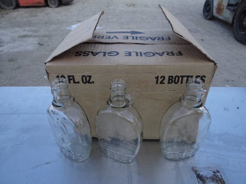 lot 1135 image: Case of (12) 12oz. Glass Bottles