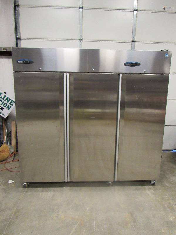 lot 1001 image: Hoshizaki Stainless 3 Door, Dual Compartment, Commercial Refrigerator On Casters
