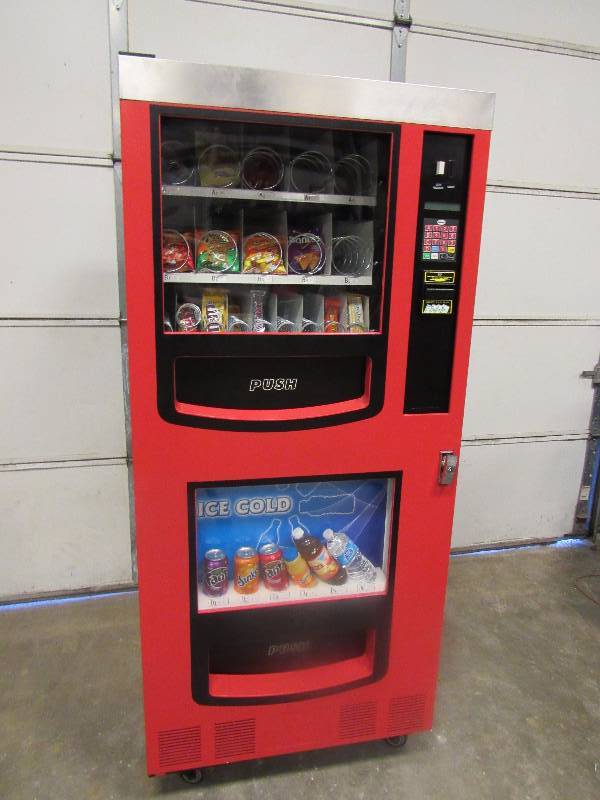 lot 1003 image: Gaines Cold Drink And Snack Machine