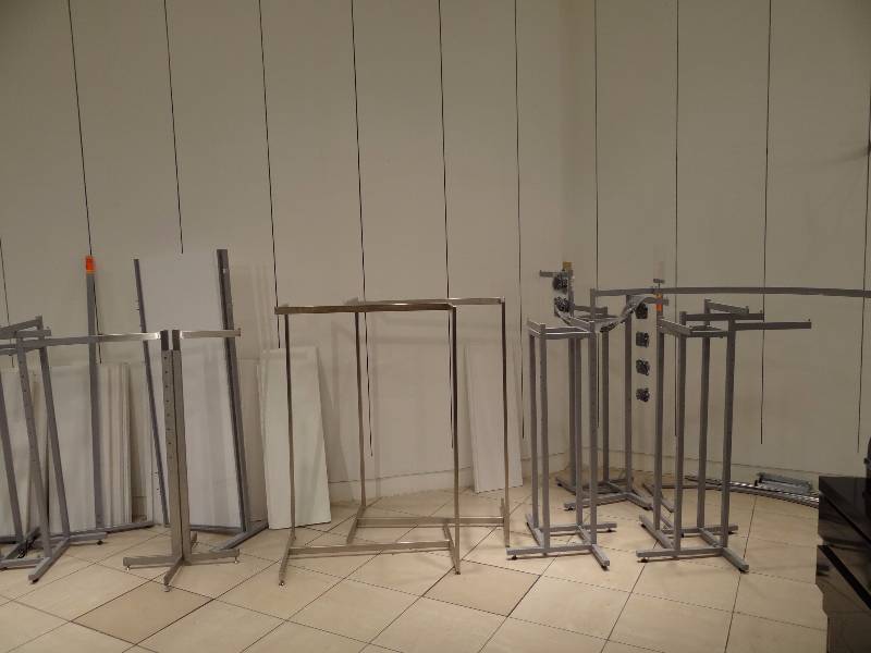 lot 1201 image: Large Lot of Metal Framed Merchandise Display Racks For Hanging Clothes