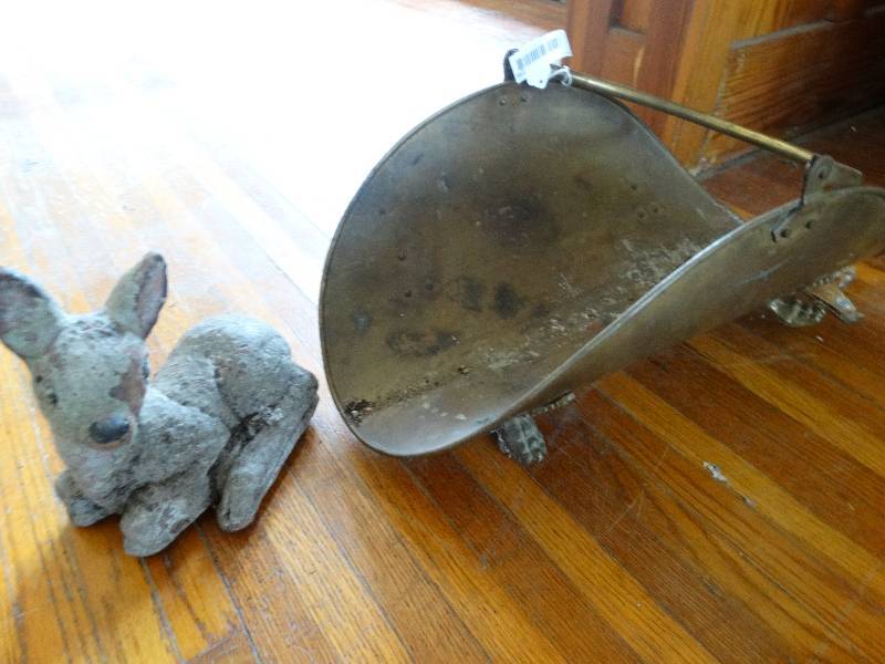 lot 146 image: Metal firewood holder & cement deer