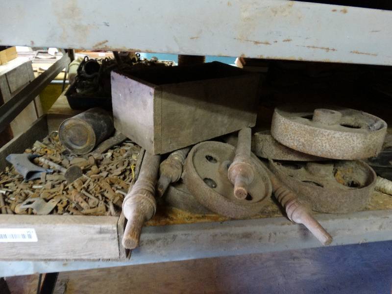 lot 367 image: Wood box w various hardware, table legs & old metal wheels.