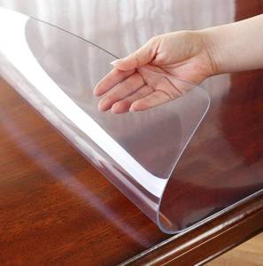 lot 15774 image: OstepDecor 2mm Thick 24 x 60 Inch Clear Table Protector, Clear Table Cover Protector, Plastic Clear Desk Pad Desk Mat for Coffee Table, Writing Desk, Dining Room