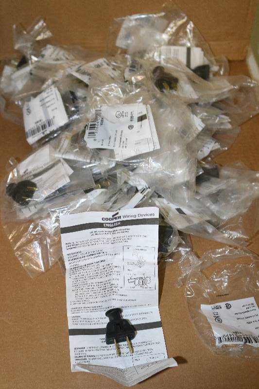 lot 6783 image: 48 Black Cooper Wiring Flat Handle Plugs