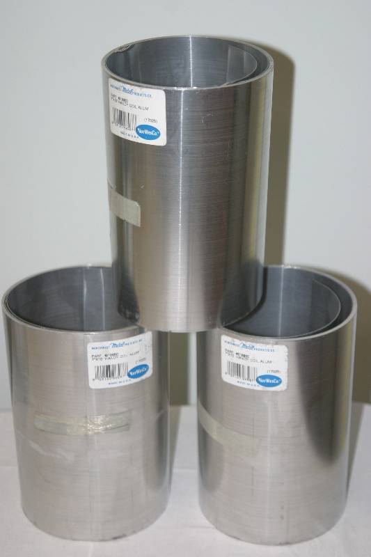 lot 7371 image: 3 Rolls 7 x 10 Handy Coil Roll Aluminum by Norwesco