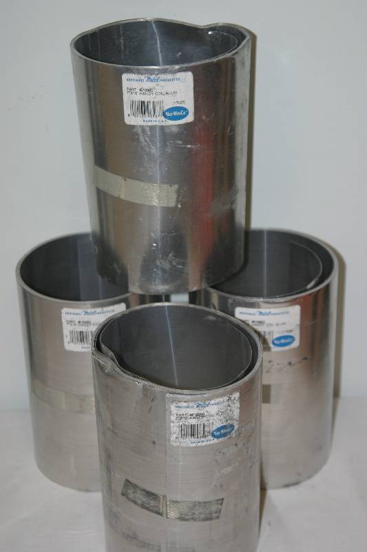 lot 7373 image: 4 Rolls 7 x 10 Handy Coil Roll Aluminum by Norwesco