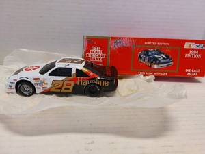 lot 40656 image: Racing Champions 124 Scale Die Cast Car BANK #28 Havoline
