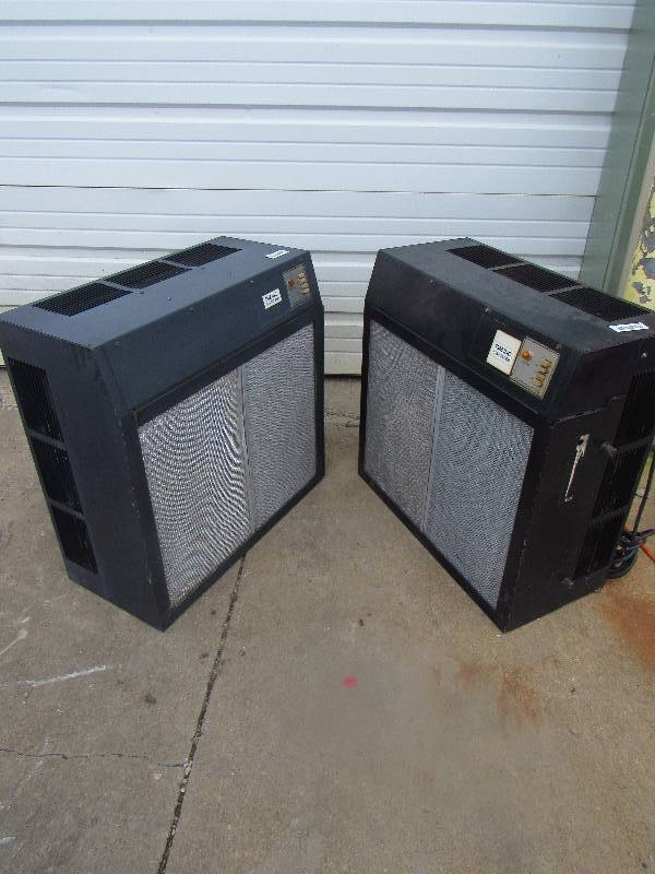 lot 629 image: Pair Of TSM Inc. Smoke Eaters