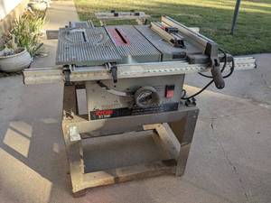 lot 891 image: Ryobi BT3000 Table Saw W Stand