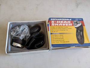 lot 898 image: 3-Head Shaver  No Charger Cord