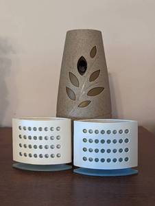 lot 563 image: (2) Small Spaces Holders and Glade Diffuser.