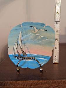 lot 567 image: Sailboat Sand Dollar on Stand.