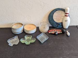 lot 579 image: Club, Diamond, Spade Trinket Dishes, Candle, Coster Set and Bowling Decor.