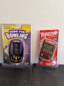 lot 586 image: Bowling and Yahtzee Handheld Games.